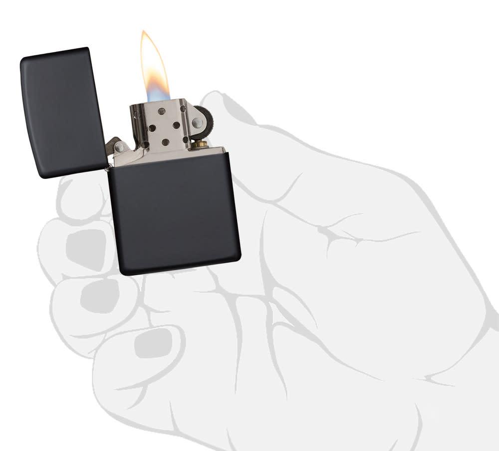 Classic Black Matte Windproof Lighter lit in hand
