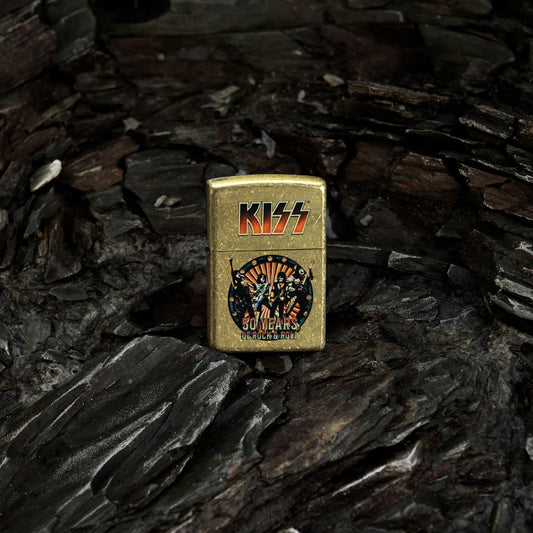 Lifestyle image of Zippo KISS® 50 Years Design Street Brass Windproof Lighter standing in a close up of a salt cave.